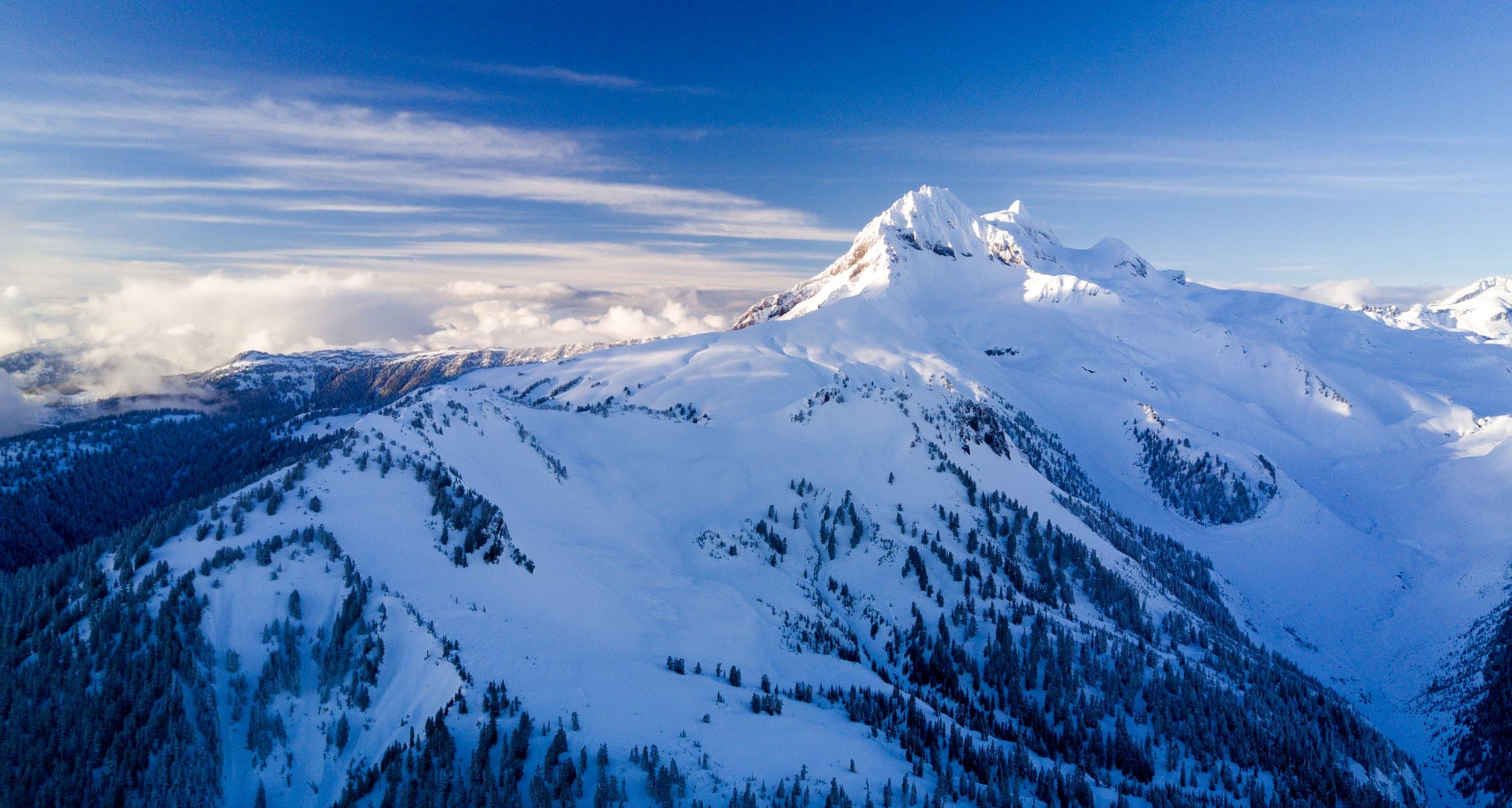 Mount Garibaldi stands under winter snow in Garibaldi Provincial Park.