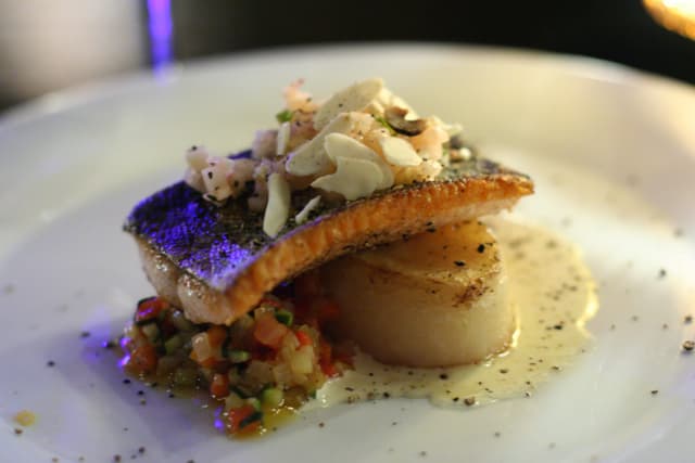 Seared fish sits on a white plate from a Dine Out Vancouver set menu at the Granville Room in January 2009.