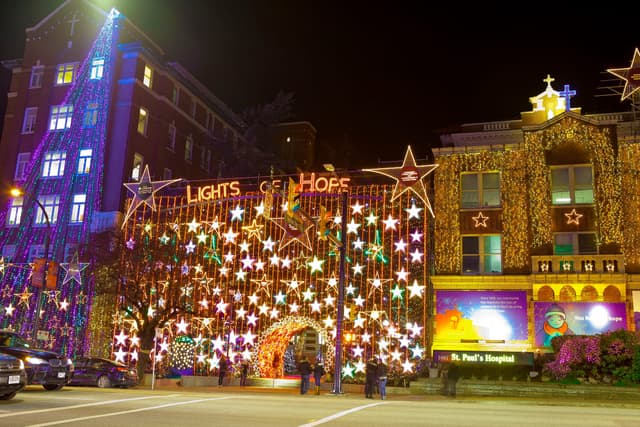 Thousands of lights and stars cover the facade of St. Paul's Hospital on Burrard Street for Lights of Hope.