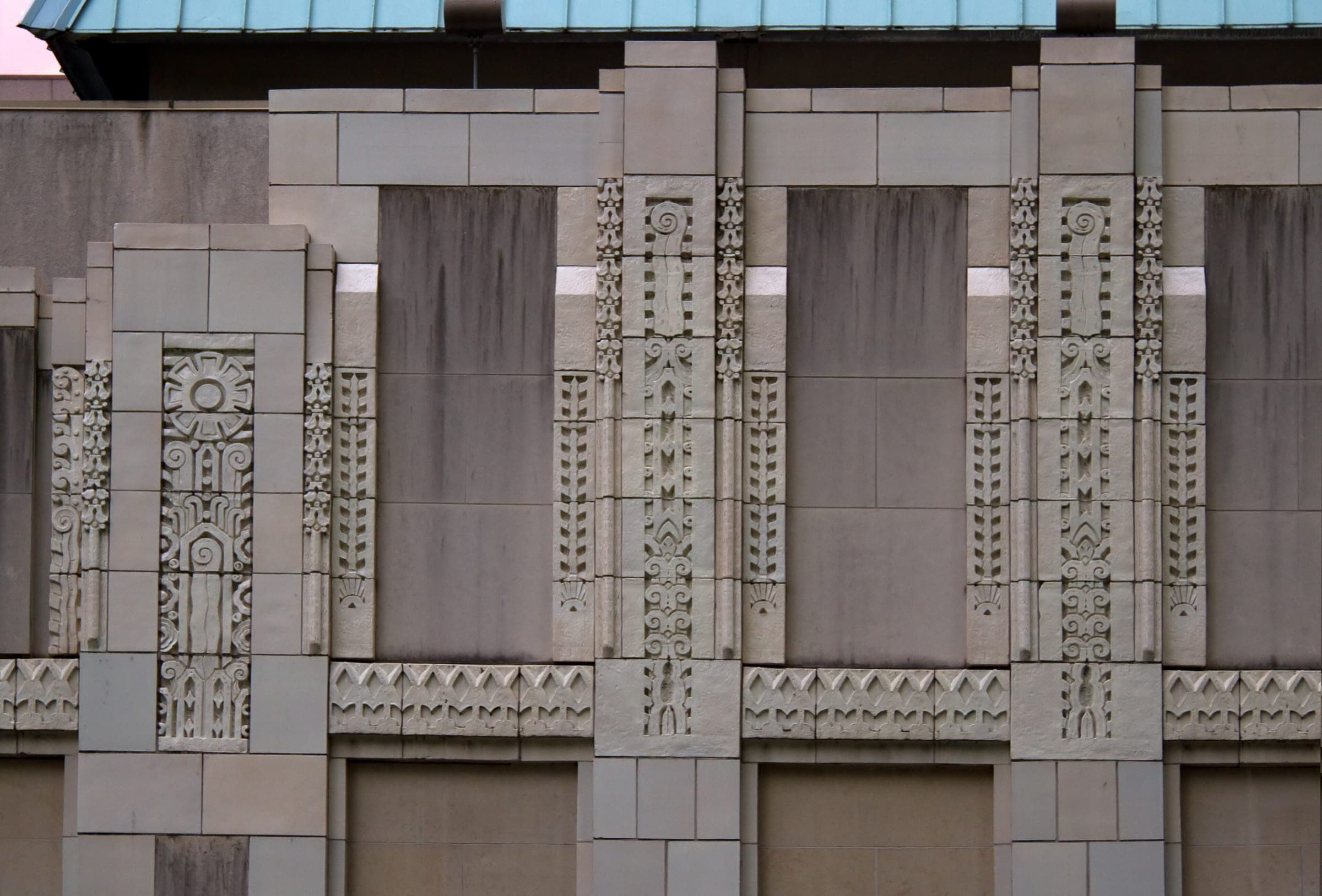 Carved stone detail on the Hornby Street front of the Bill Reid Gallery of Northwest Coast Art.