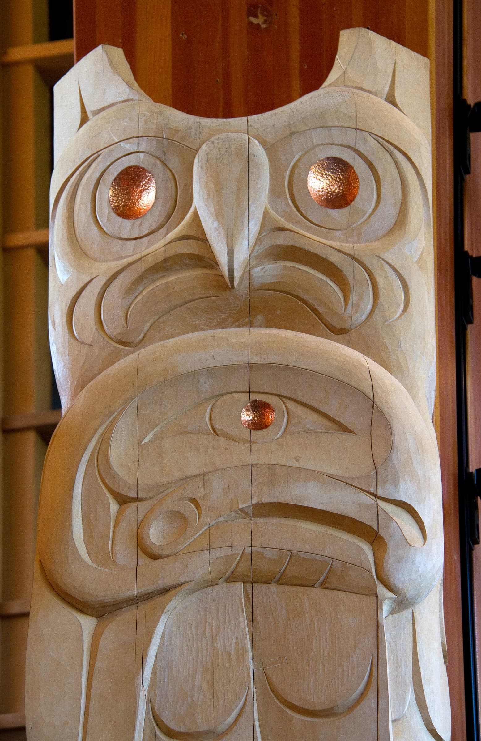 Carved cedar post inside the Squamish Lil'wat Cultural Centre in Whistler.