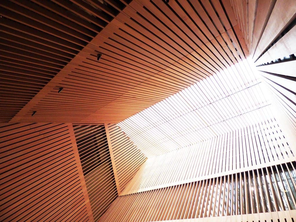 Daylight pours through the slatted cedar roof over the entrance court of the Audain Art Museum in Whistler.
