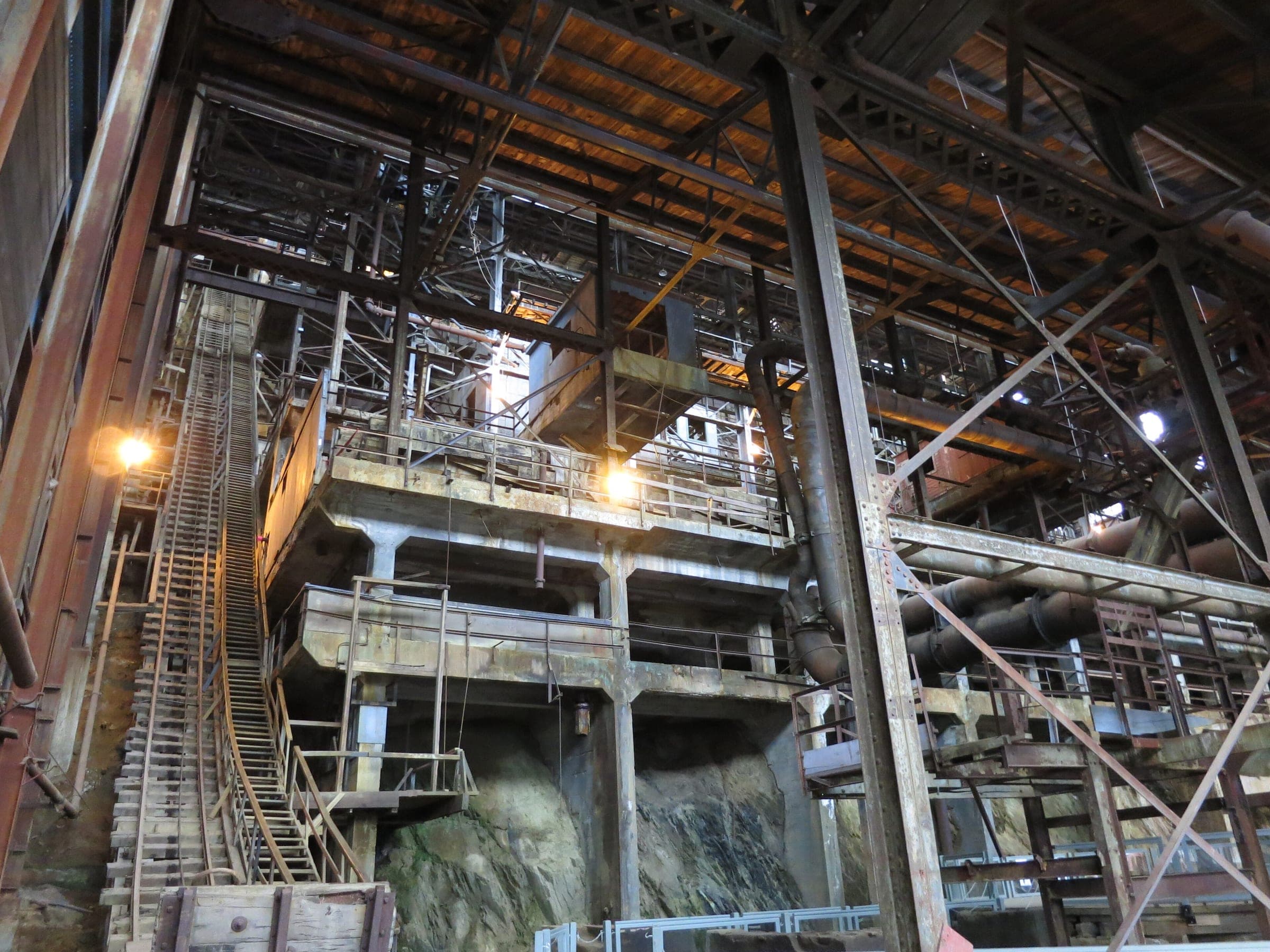 Stairs and steel chutes climb through the gravity-fed mill building at the Britannia Mine Museum.