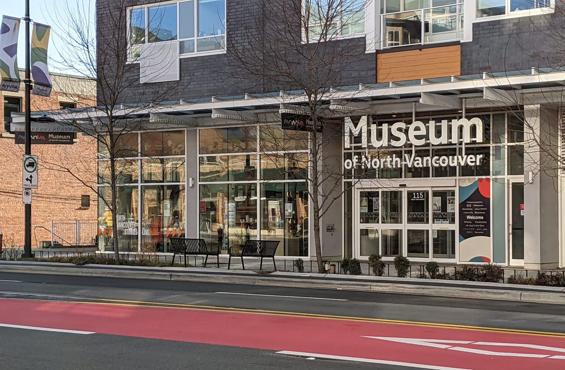 The Museum of North Vancouver opens onto West Esplanade beside a bus stop and the red bus lane.