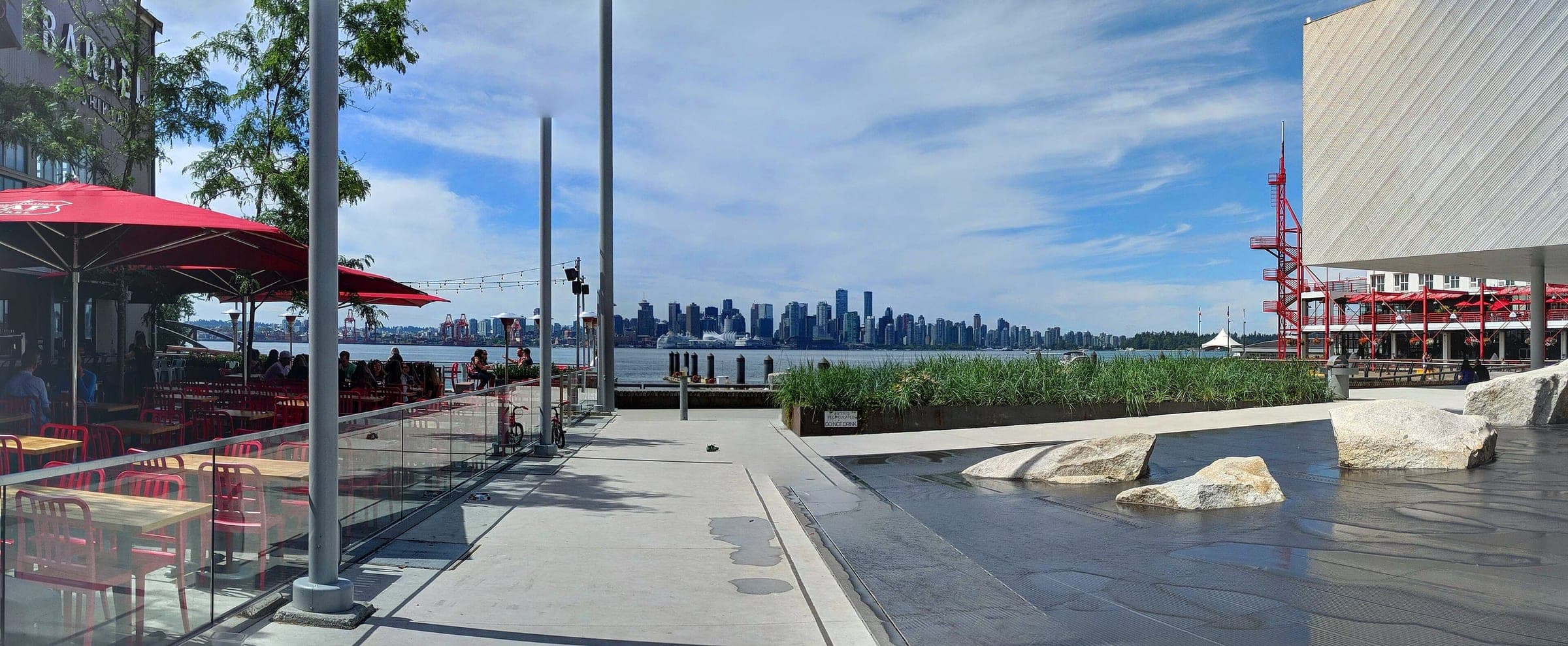 The plaza at the foot of Lonsdale looks across Burrard Inlet to downtown Vancouver beside the Polygon Gallery.