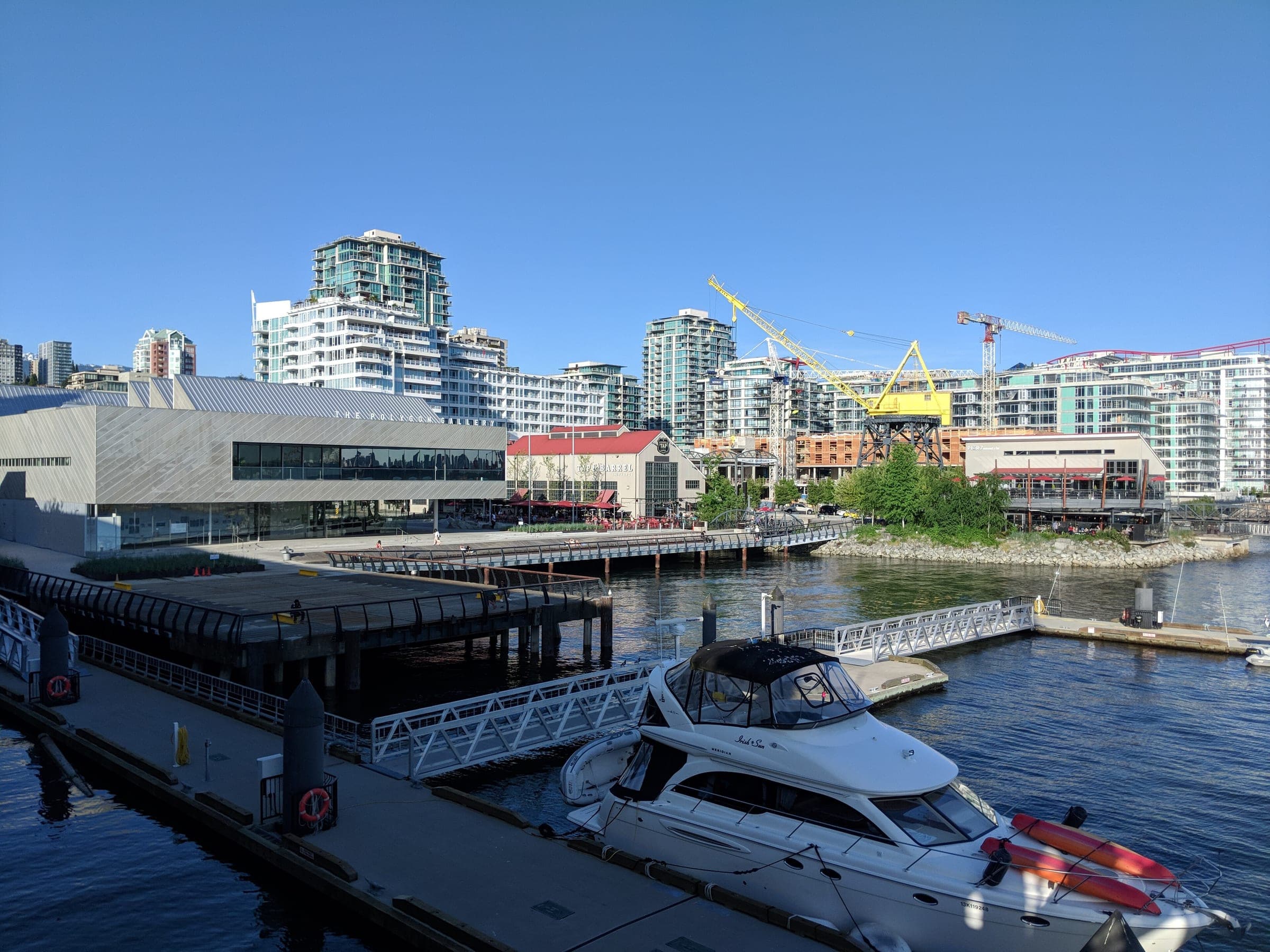The Shipyards and the Polygon Gallery line the North Vancouver waterfront seen from Lonsdale Quay.