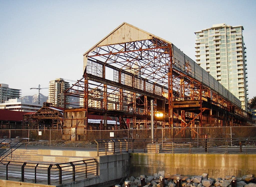 The bare steel frame of an old Burrard Dry Dock shed stands at the Shipyards in North Vancouver.
