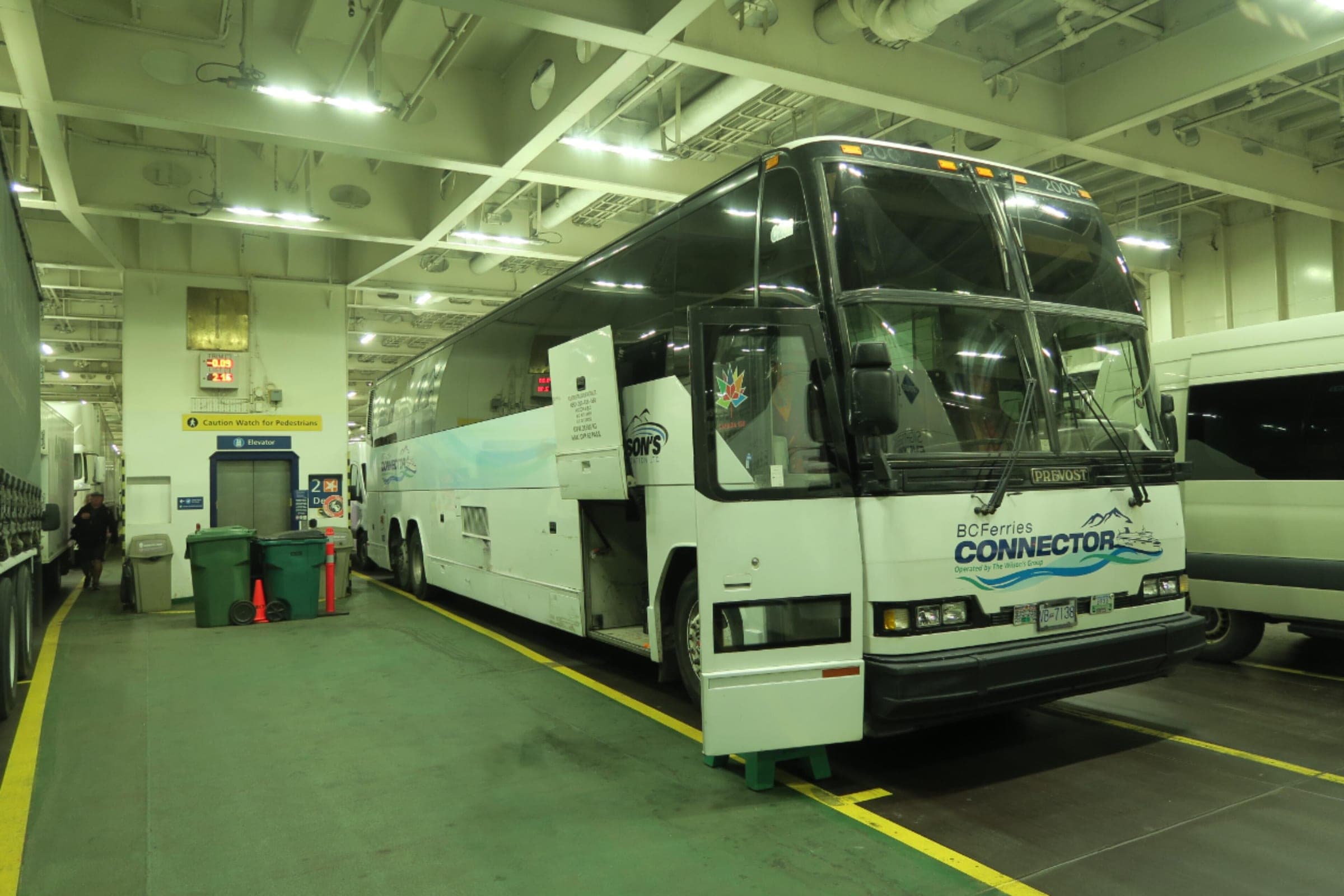 A Wilson's Transportation coach sits on the car deck of a BC Ferries vessel bound for Vancouver Island.