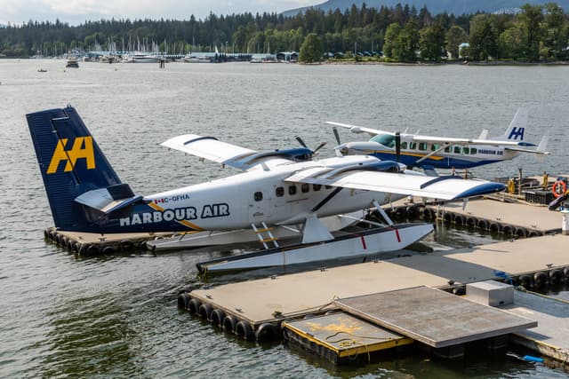 Harbour Air seaplanes tie up at the Vancouver Harbour Flight Centre dock.